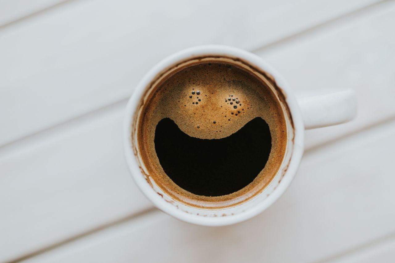 Coffee on a table with other items